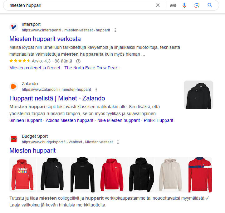 Hakutulossivu (SERP) Google-haulle 'miesten huppari', joka näyttää useita hakutuloksia sisältäen rich snippets -elementtejä, kuten tähtiarvosteluja ja tuotekuvia, osoittaen strukturoitua dataa käytännössä.